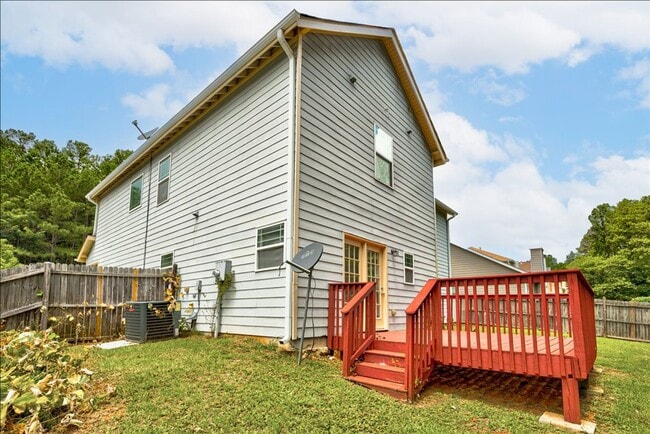 Building Photo - Welcome to this stunning 4-bedroom, 2.5-ba...