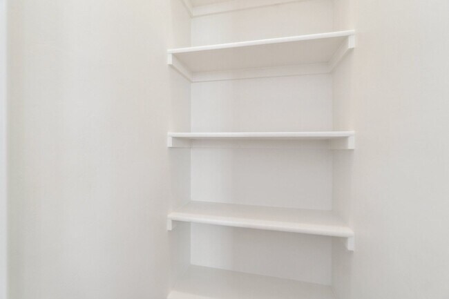 Building Photo - Minimalist Magic: 2-Bed Apartment Over Sel...