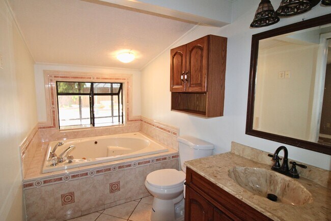 Building Photo - Stunning 3-Bed, 2-Bath Spanish-Inspired Custom Home with Elegant Gardens & Fountains