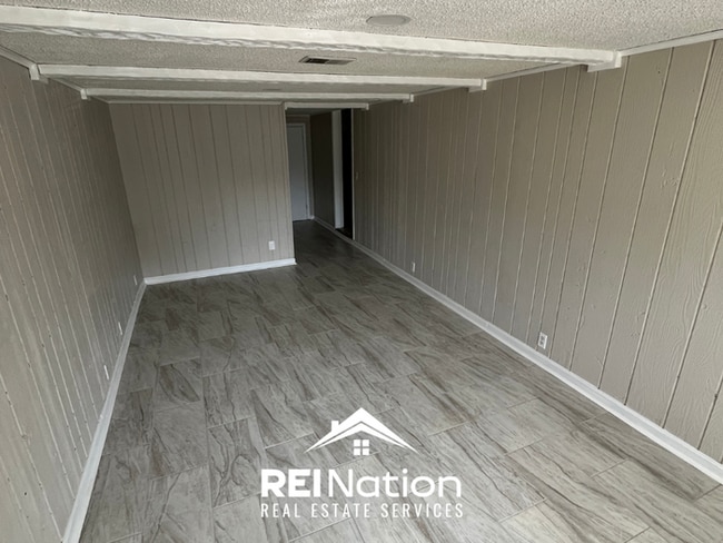 Building Photo - RARE FIND! 4BR/2BA in Memphis | Open Kitchen & Hardwoods | Fenced Yard!