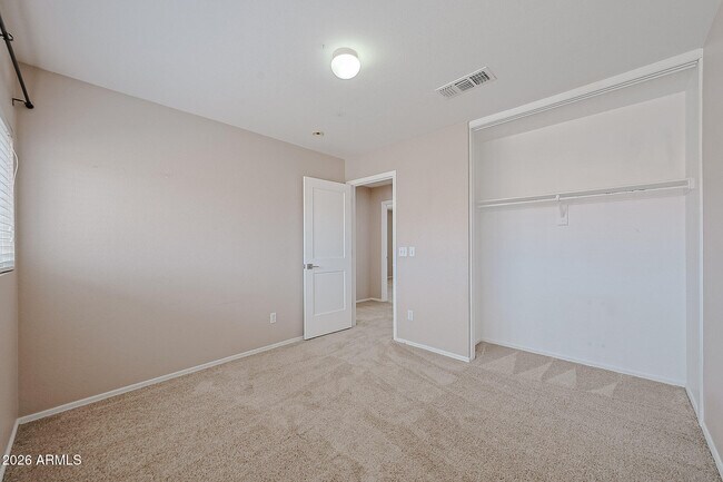 Building Photo - 15569 W Gelding Dr
