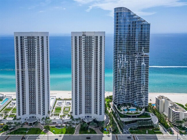 Building Photo - 15811 Collins Ave