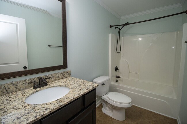 Building Photo - Elegant All-Brick 4 Bedroom Home on a Quie...
