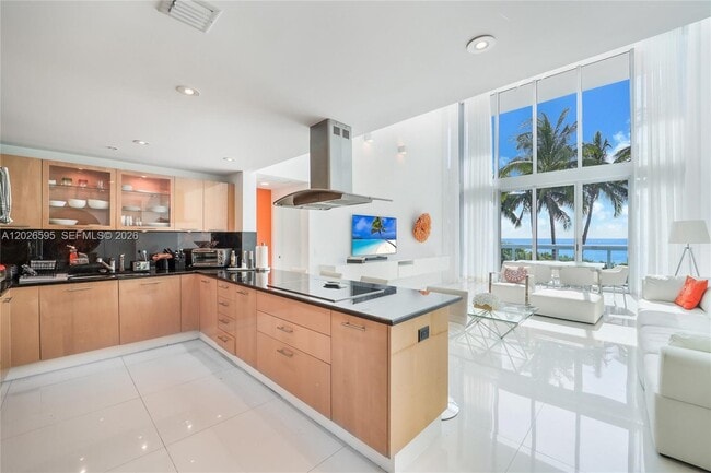 Building Photo - 6899 Collins Ave