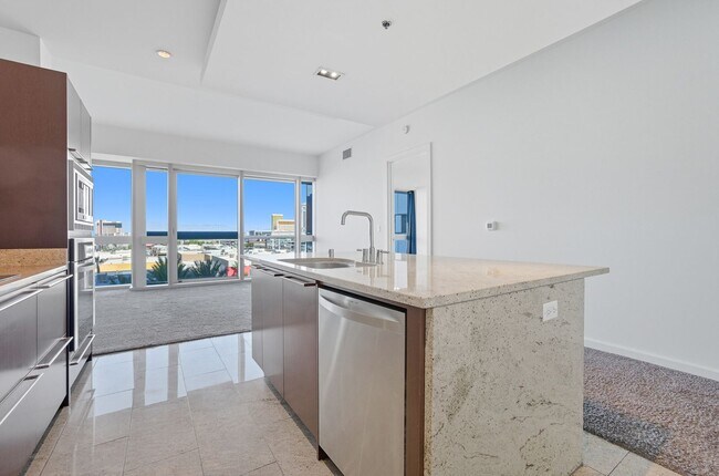 Building Photo - 6th Floor 2-Bedroom Condo with Stunning La...