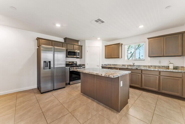 Building Photo - Modern Gated Townhome Living with Resort-Style Community Amenities