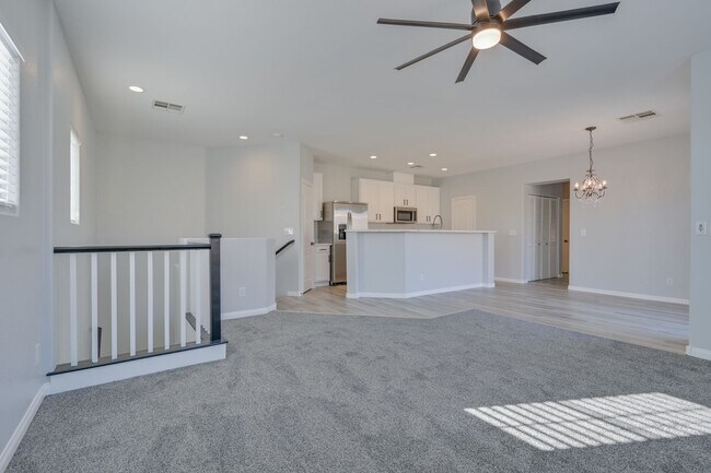 Building Photo - NW!! Gated!! Community Pool/Spa  Recreation Room!! New Paint!! New Flooring!!  Balcony!!  2 car g...