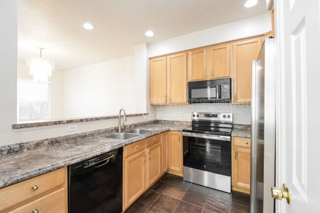 Building Photo - 2241 E 128th Ave