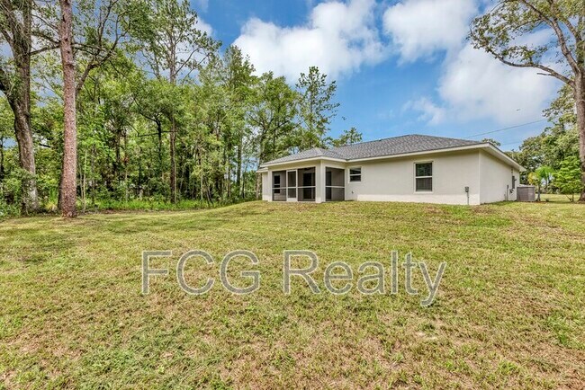 Building Photo - 6551 Hemlock Rd