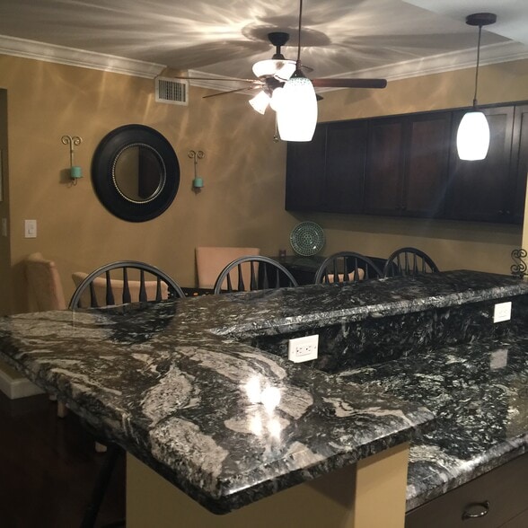 view from kitchen into dinning room and offic - 123 Deer Creek Blvd