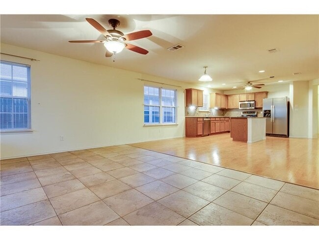 Building Photo - Beautiful single-story home with a front g...