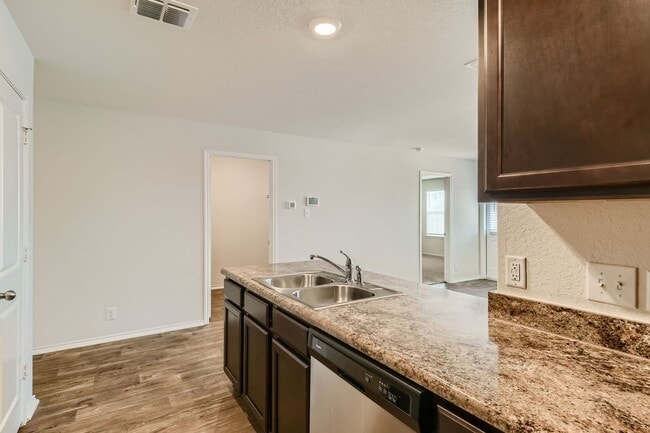 Building Photo - HALF OFF First Month Rent located near Lac...