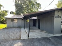 Building Photo - Spacious duplex! Carport, a/c, WASHER & DR...