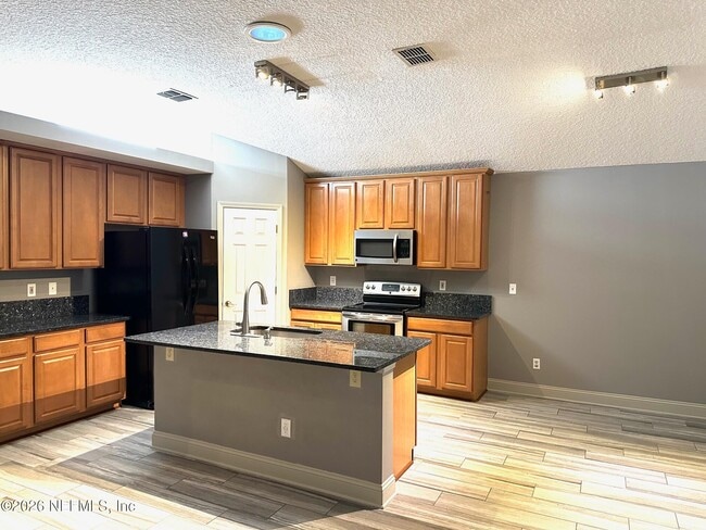 Building Photo - 5388 Hidden Gardens Dr