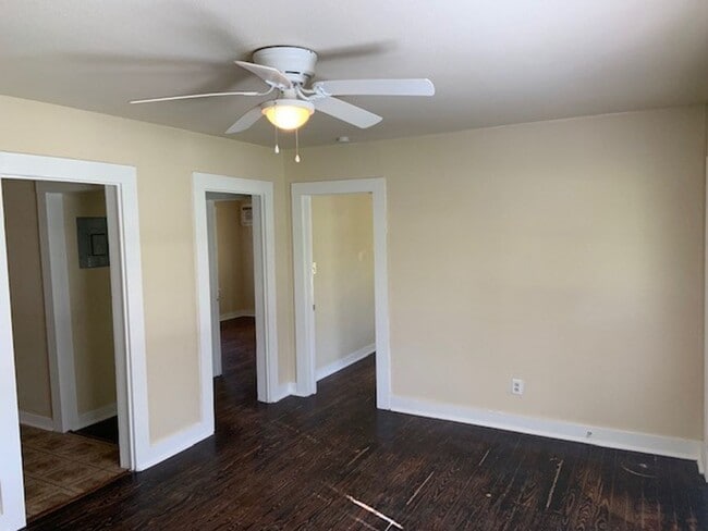 Building Photo - *COMING SOON* Charming Cottage Retreat with Fenced Yard!