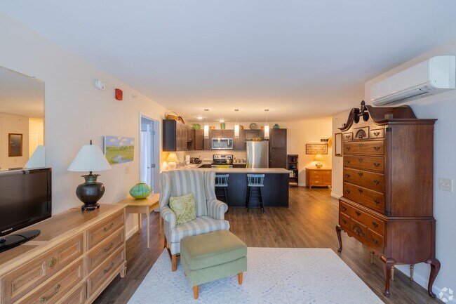 Building Photo - Spacious 1-Bedroom with Den & Premium Amenities at Village at Autumn Pond