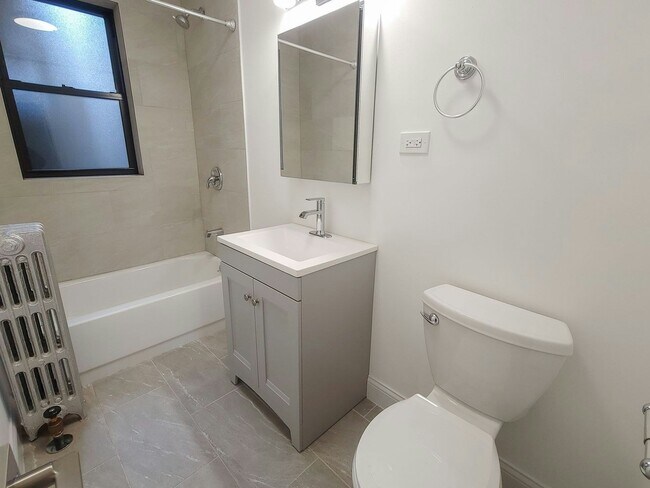 Building Photo - 1606-1 West Sunnyside Avenue, Unit 1