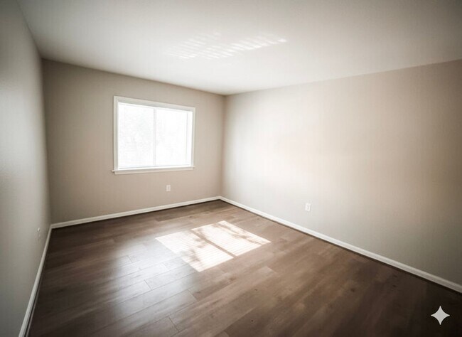 Building Photo - Spacious and Convenient 2-Bedroom Condo in...