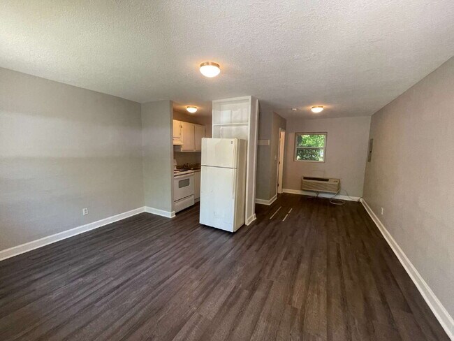 Building Photo - Available now. Upgraded studio!
