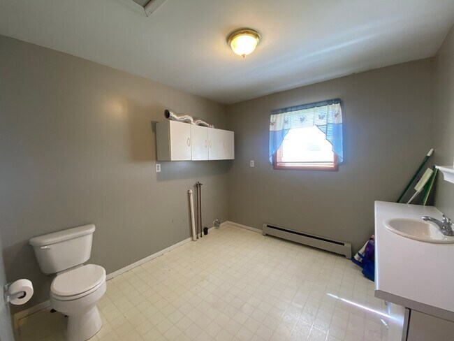 Building Photo - Beautiful secluded 4 bedroom 2.5 bath home with 2 stall detached garage and descent sized yard