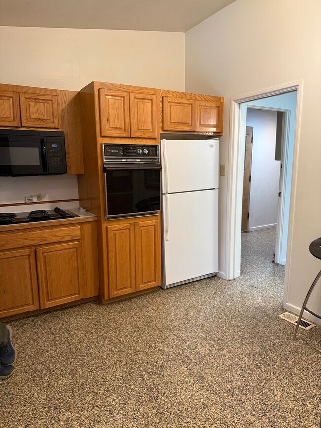 Kitchen with view into Utility Room - 1020 N 20th St