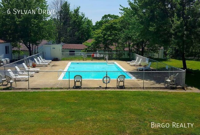 Building Photo - Warm up next to the fire in this 2 bedroom...