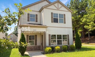 Building Photo - 4 Bed, 3 Bath Home with Garage / Pet-Friendly / Available Now!