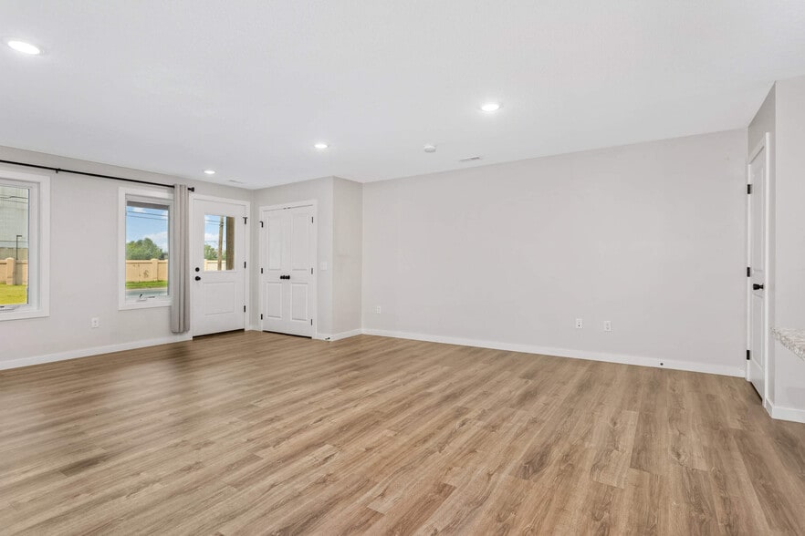 view of the living room looking at the front door - 2927 Marshall St NE