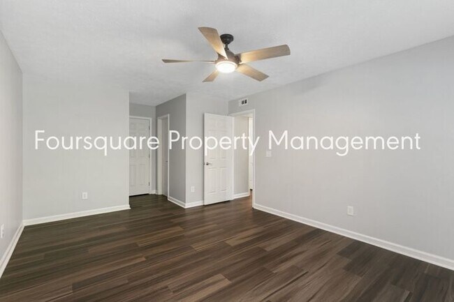 Building Photo - Charming 1st-Floor End-Unit Condo with Gas Log Fireplace, Private Back Porch & Community Pool – T...