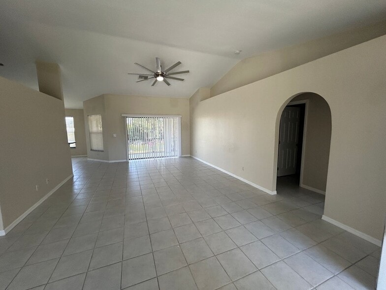 Building Photo - Freshly painted interior 2/2  spacious home on fresh water canal