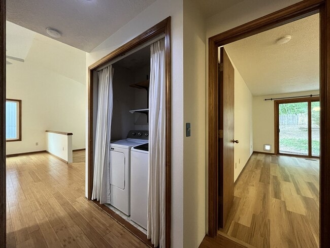 Building Photo - Spacious 3-Bedroom Home with Custom Stone Fireplace, Attached 2-Car Garage & Expansive Backyard i...