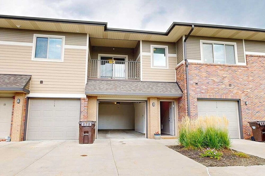 Enjoy the convenience of an attached garage, offering covered parking and extra storage space. - The Villas at Falling Waters