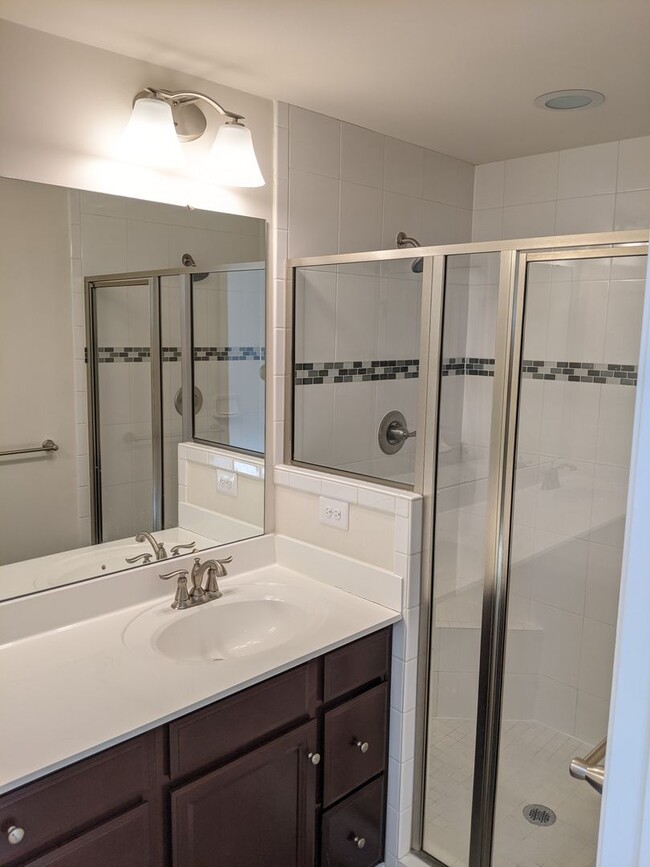 Building Photo - Bottom level (two story) *END UNIT* condo ...