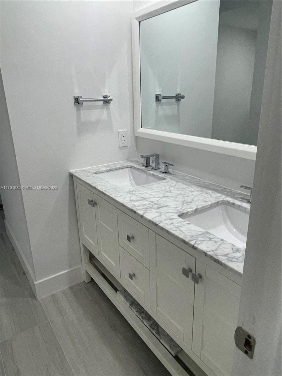 Master bedroom vanity with dual sinks - 575 Crandon Blvd