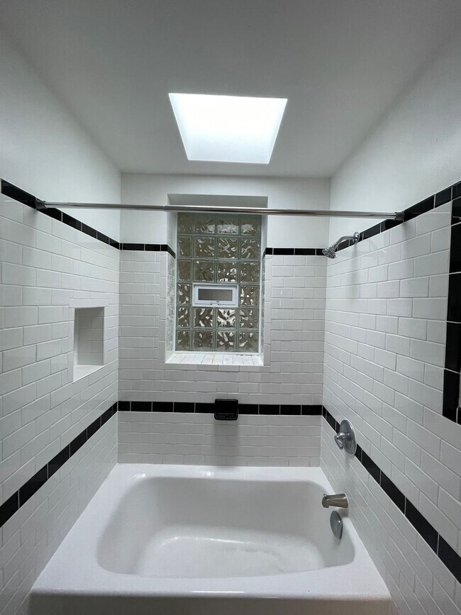 Building Photo - Charming 1928 Row Home for Rent with Modern Amenities — 3 Bedroom 2 Full Bath w/ 2 Half Baths, 2 ...