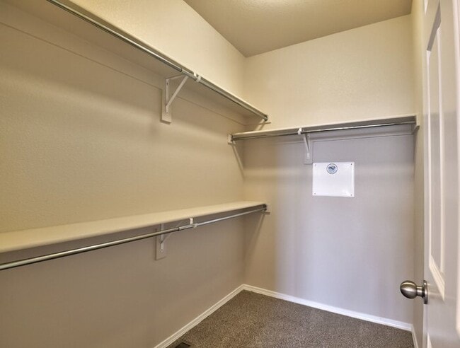 Building Photo - Immaculate 3-Bedroom Townhome with Stainless Steel Appliances and Attached Garage Near Peterson SFB