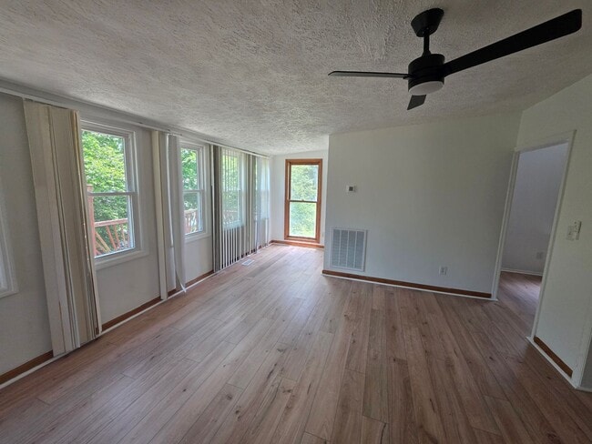 Building Photo - Updated Lake House in Crossville with Private Dock, Wrap-Around Porch & Lake Access