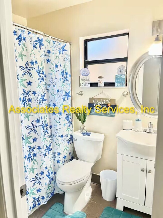 Building Photo - Beautifully furnished  2-Bedroom Duplex – ...