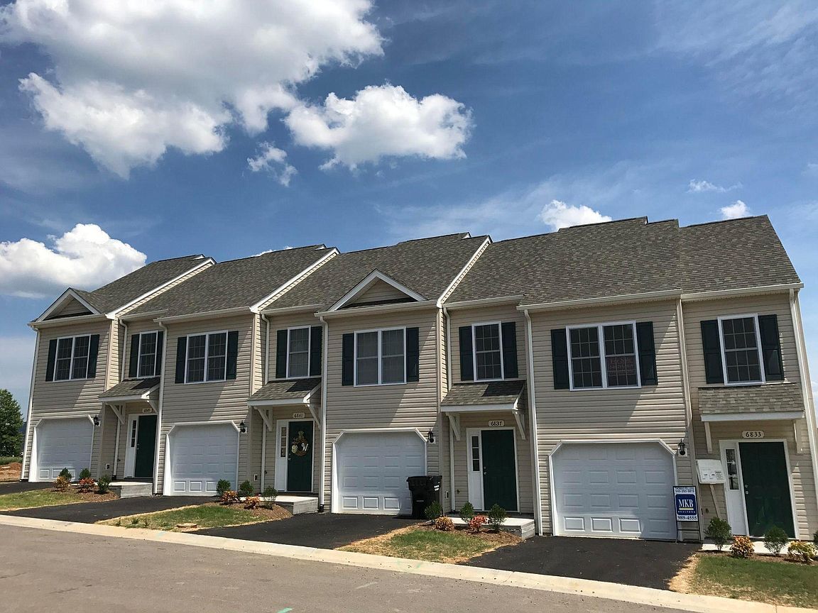 Building Photo - 6849 Village Green Dr