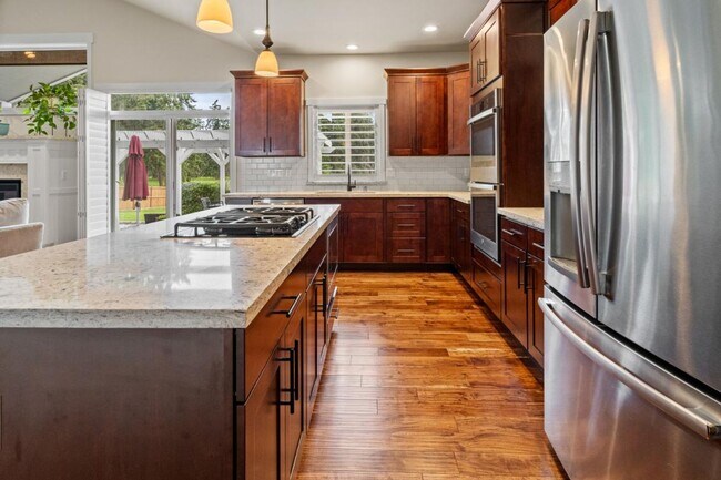 Building Photo - Luxury Yelm Estate on ¾ Acre with Custom Outdoor Living, Loft, A/C & Designer Kitchen!