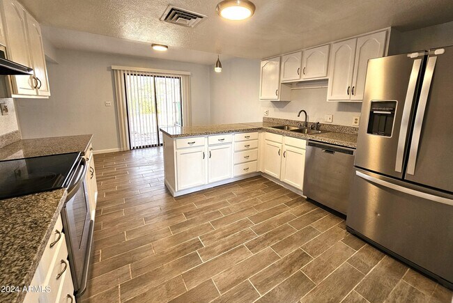 Building Photo - 8220 W Monaco Blvd