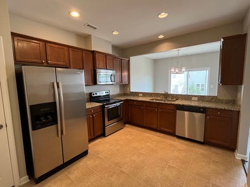 Building Photo - **OFFERING REFUNDABLE APPLICATION FEES** Fantastic 3BD, 2.5BA North Raleigh Townhome with Fenced ...