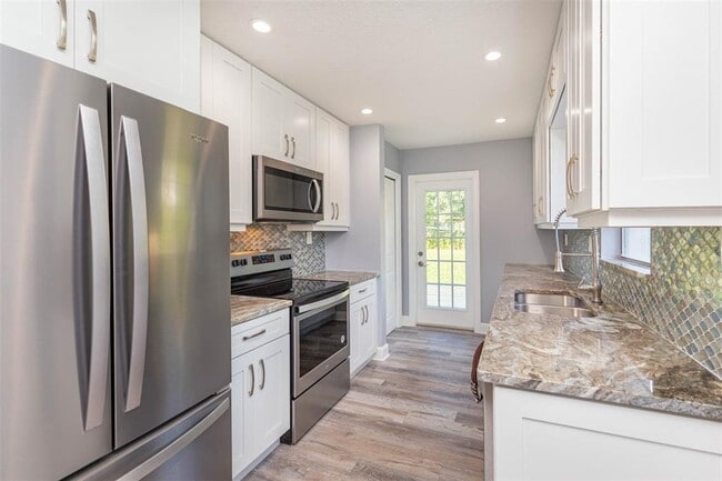 Building Photo - 3911 W Tyson Ave