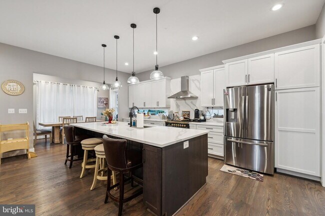 Building Photo - This meticulously cared-for residence, constructed in 2021 by Danforth Homes, presents everything...