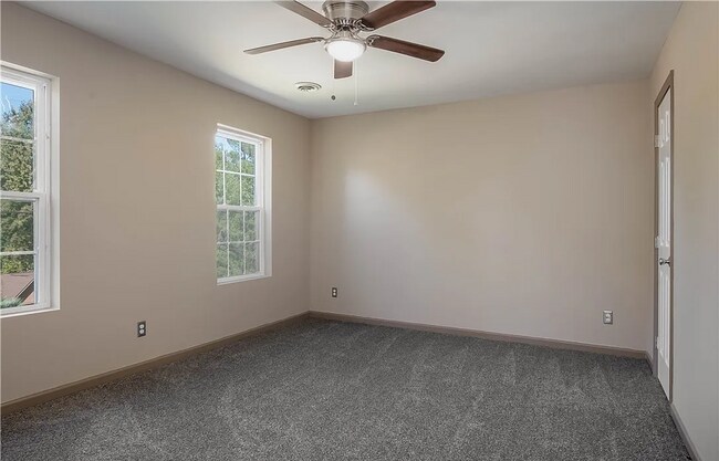 Building Photo - This Charming Two-Story Home Awaits You