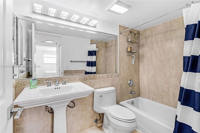 Building Photo - 5880 Collins Ave