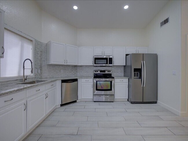 Building Photo - Spacious 3-Bedroom Home with 3-Car Garage & Large Backyard