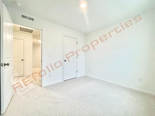 Building Photo - Brand New 3 Story, 4 bedroom, 3.5 bathroom Townhome Featuring a 1st floor Guest Suite, 2 Car Gara...