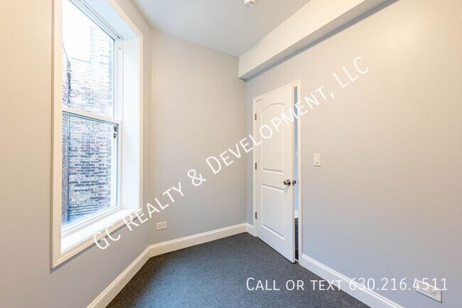 Building Photo - 6433 S Vernon Ave