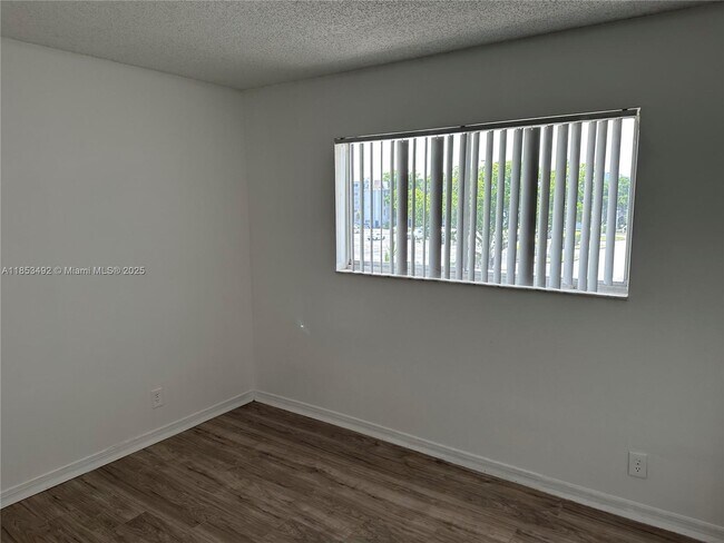 Building Photo - 8540 N Sherman Cir
